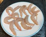 Foto del paso 7 de la receta Filetes de merluza en salsa de gambas