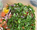 A picture of step 1 of Tomato, cucumber and avocado salad.