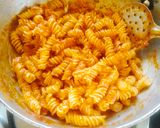 A picture of step 4 of Red sauce pasta (cheese red sauce pasta).