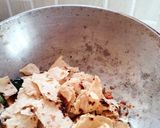 A picture of step 3 of Seyal phulka (leftover rotis in garlic tomato curry).