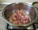 Foto del paso 2 de la receta: Guiso de cerdo con garbanzos a la naranja