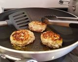 A picture of step 8 of Bring-a-smile chicken burgers with blue cheese or pesto filling 😊.