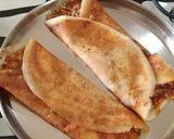 A picture of step 2 of Breakfast cheese and podi dosa.