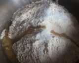 A picture of step 1 of Lachha paratha with masala Arbi and raiyta.