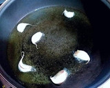 Foto del paso 1 de la receta: Pimientos rojos confitados con ajos y estragón