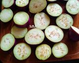 A picture of step 1 of Dahi Baingan with roasted cumins powder.