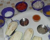 A picture of step 1 of Spicy Bringal Masala.