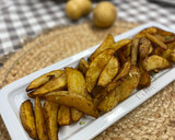 Foto del paso 4 de la receta: Patatas gajo especiadas al horno