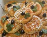 صورة لخطوة 8 من وصفة ميني بيتزا لمناسباتكم