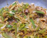 A picture of step 3 of बेसन घालून सिमला मिरचीची भाजी (Besan Shimla Mirchichi Bhaji Recipe In Marathi).