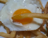 Foto del paso 8 de la receta: Milanesa a la napolitana con papas fritas y huevo