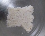A picture of step 5 of Jeera rice with dal fry.