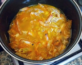 Foto del paso 3 de la receta: Dorada al horno con langostinos macerados y patatas guisadas
