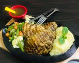 A picture of step 8 of Black pepper chicken steak.
