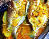 Foto del paso 12 de la receta: Dorada al horno con langostinos macerados y patatas guisadas