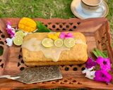 A picture of step 13 of Mango Loaf Cake with lime glaze.