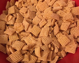 A picture of step 1 of Buddy the elf Chex mix.