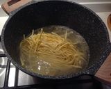 Foto del passaggio 3 della ricetta Tagliolini con mini peperoni, pecorino e pepe tostato