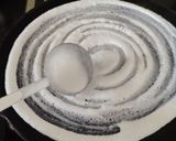 A picture of step 2 of Moringa powder onion dosa.