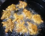 A picture of step 6 of Curry pakora in green and with red Chilli tarka.