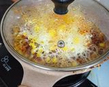 A picture of step 5 of Maggi Corn Pizza.