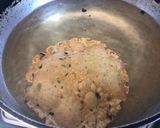 A picture of step 6 of Bajra Methi Puri.