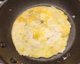 A picture of step 2 of Egg Frankie.