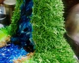 A picture of step 12 of Blackforest jungle theme cake.