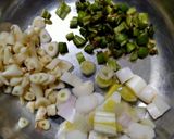 A picture of step 1 of Spring onion fried rice.