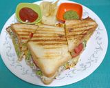 A picture of step 7 of Schezwan Cheese Toast Sandwich (A Mumbai road-side delight).