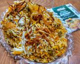 A picture of step 11 of Bombay Biryani.