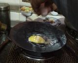 A picture of step 2 of Easy Egg Half Fry.