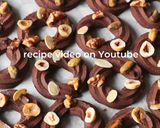 A picture of step 1 of Christmas Wreath Cookies [Chocolate Spritz].