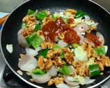 A picture of step 4 of Walnut Schezwan Stir Fry.