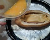 Foto del paso 5 de la receta: Volcán de pan con queso y algo más