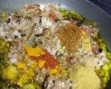 A picture of step 7 of Baingan bharta with spring onion.