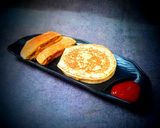 A picture of step 9 of Semolina pancakes spicy sandwiches.