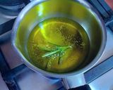 Foto del paso 4 de la receta Lágrimas y yemas de vainas de habas en aceite de oliva y Romero