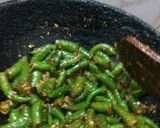 A picture of step 5 of Green chilli pickle.