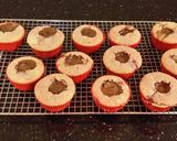 A picture of step 14 of Fresh Strawberry Chocolate Truffle Cupcakes with Fresh Strawberry Whipped Cream Frosting.