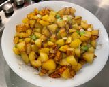 Une image de l'étape 10 de Pommes de terre sautées aux oignons nouveaux.