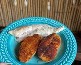 Foto del paso 4 de la receta: Filet de merluza con papas al horno 🐟🥔