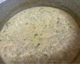 A picture of step 4 of Mushroom mattar curry with coconut flavour.