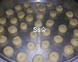 صورة لخطوة 9 من وصفة غريبة😀من حلويات العيد💃 وتزيينهابأكثرمن شكل