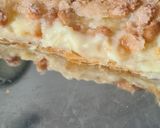 Foto del paso 18 de la receta: 179. Coca de San Juan de hojaldre, crema y piñones