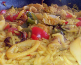 Foto del paso 5 de la receta: Arroz con chipirones y almejas🥘