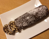 Foto del passaggio 8 della ricetta Salame al cioccolato con le nocciole