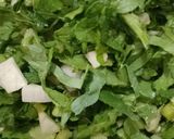 A picture of step 1 of Muli k patto ki sabji.
