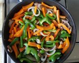 A picture of step 4 of Mustard Chicken Thighs with Bell Pepper and Mushroom Side.