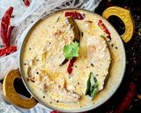 A picture of step 6 of Dahi baigan.